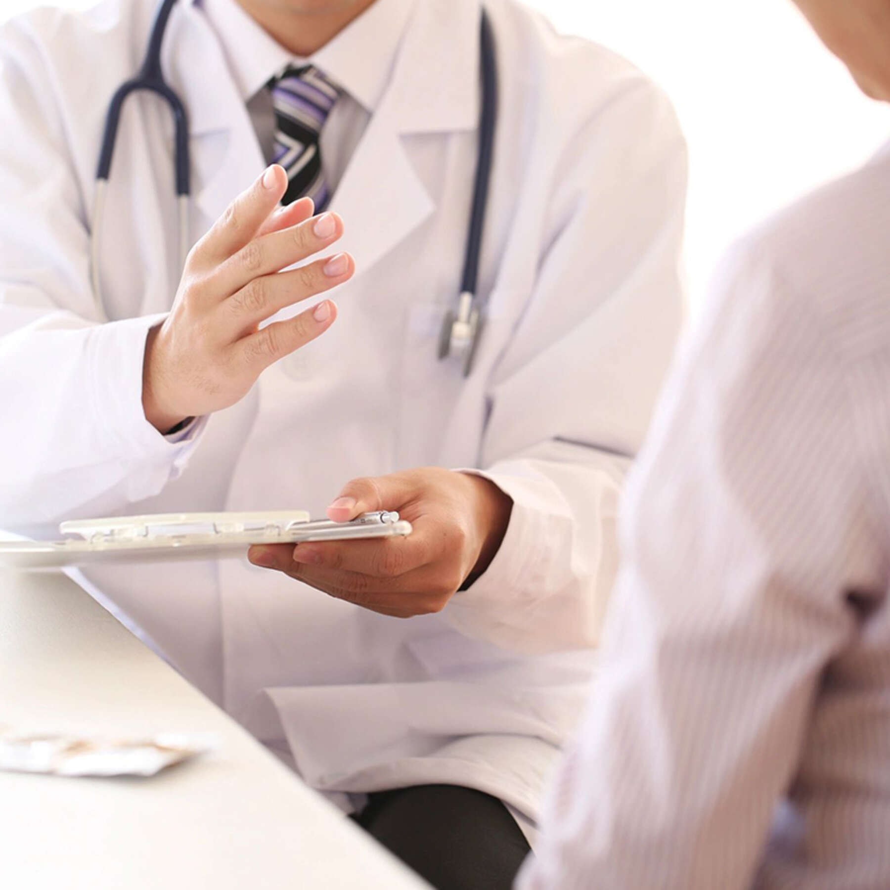Healthcare professional with patient